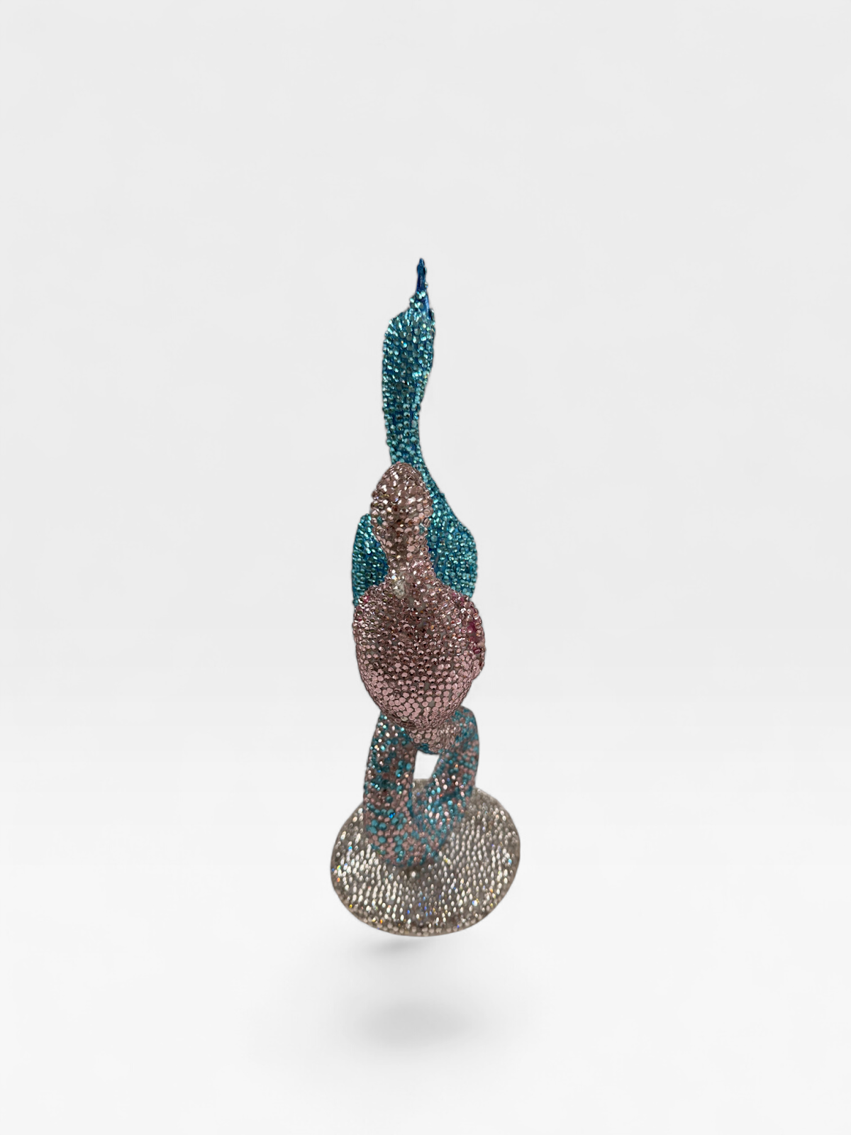 Turquoise and pink rhinestone swans, back view